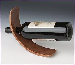 Photo of Curved Single Bottle Wood Wine Stand